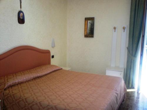 Una cama o camas en una habitación de Hotel Gaggiano