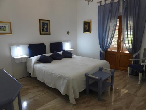 Posteľ alebo postele v izbe v ubytovaní Casa di Angela