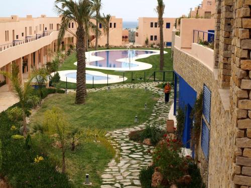 Vista de la piscina de Apartamento de lujo, para relajarse en Mojácar o d'una piscina que hi ha a prop