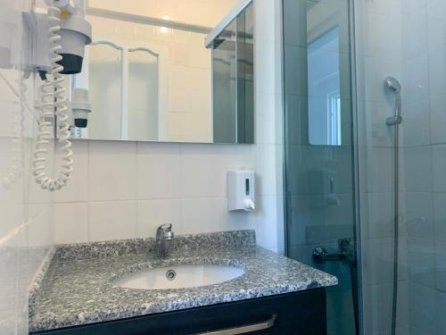 Koupelna v ubytování Kaizen Gate Hotel