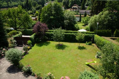 an aerial view of a garden with trees and bushes at Haus Elisabeth in Seeboden