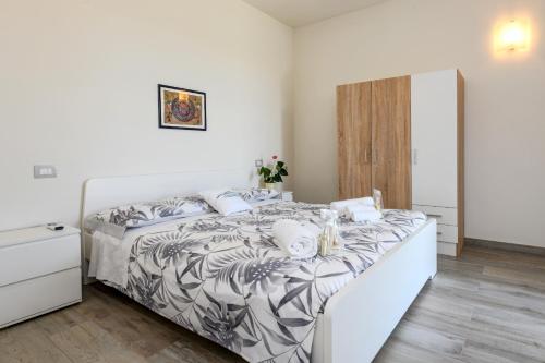 Ένα ή περισσότερα κρεβάτια σε δωμάτιο στο Casa Linda