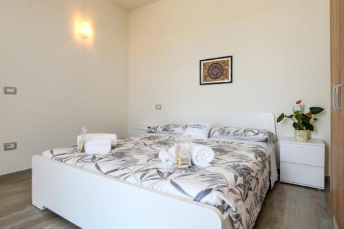 Ένα ή περισσότερα κρεβάτια σε δωμάτιο στο Casa Linda