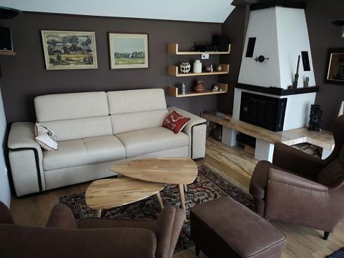 Area soggiorno di Holiday House Red Deer