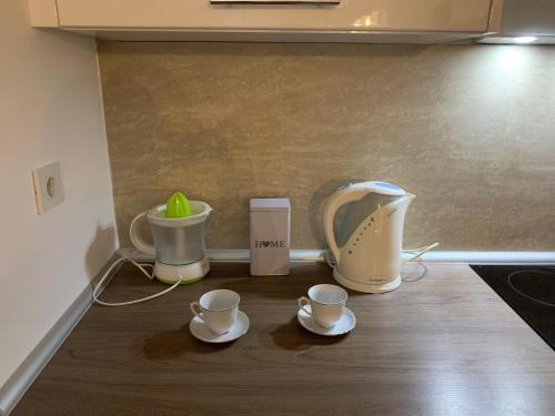Tetera y cafetera en Apartman AMIGO & Spa
