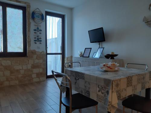 TV a/nebo společenská místnost v ubytování SeeonSea Apartment