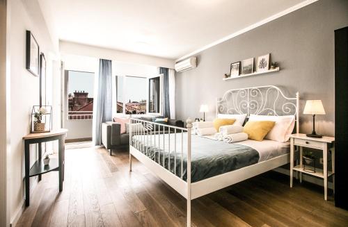 Posteľ alebo postele v izbe v ubytovaní The Harmony Rooms