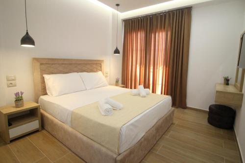 Кровать или кровати в номере Hotel Sunway