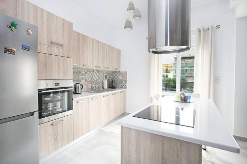 Kuchyň nebo kuchyňský kout v ubytování Greek Story - Amazing new 2bed apartment in Athens