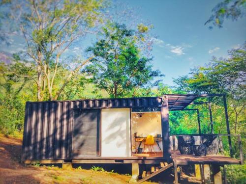 a tiny house in the middle of a forest at Area 4 eco cubes in Ella