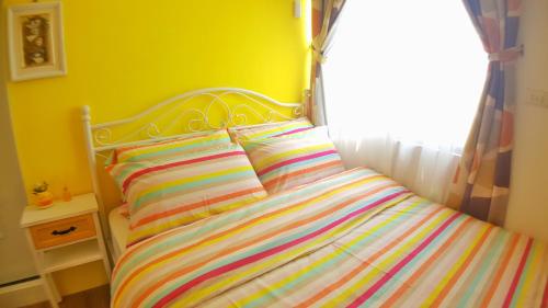 Ein Bett oder Betten in einem Zimmer der Unterkunft Lillian B&B