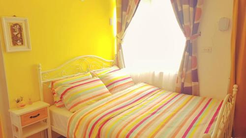 Ein Bett oder Betten in einem Zimmer der Unterkunft Lillian B&B