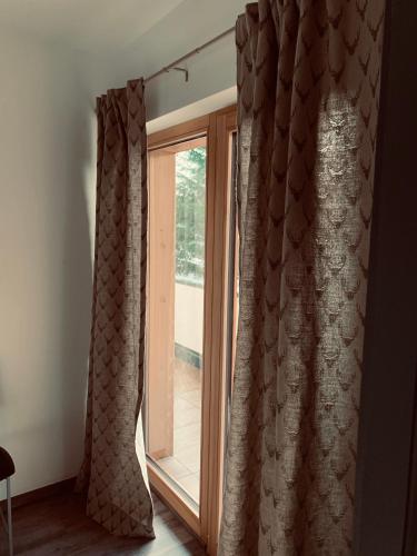 Fotografie z fotogalerie ubytování Appartamenti e B&B Casa Ester v destinaci Baselga di Pinè