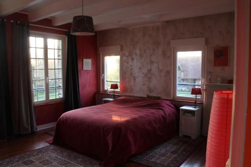 Postel nebo postele na pokoji v ubytování Chambres d'hôtes Manoir du Buquet