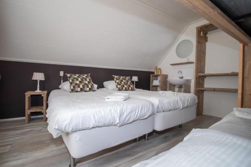 מיטה או מיטות בחדר ב-B&B Aangenaam - Olde Horst Diever
