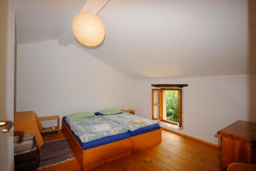 Postel nebo postele na pokoji v ubytování Nature house Jasenka