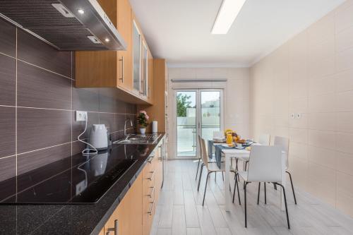 Cucina o angolo cottura di D_Loft Ocean