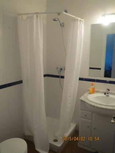 Ένα μπάνιο στο Reina Sofía Apartment