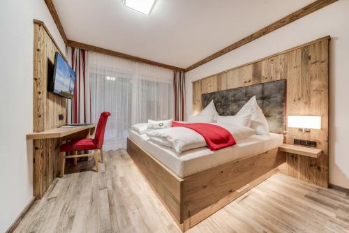 Llit o llits en una habitació de Alpen Air exklusive Apartments