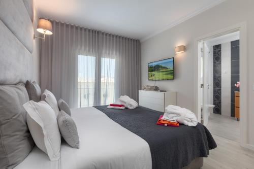 Letto o letti in una camera di D_Loft Ocean