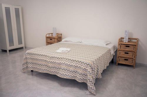 Postel nebo postele na pokoji v ubytování B&B Casa dei Nonni