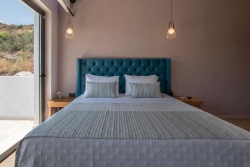 Ένα ή περισσότερα κρεβάτια σε δωμάτιο στο Villas Libra