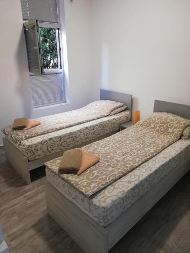 Athos Apartmentsにあるベッド