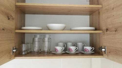 Příslušenství pro přípravu čaje a kávy v ubytování Apartmány Orlík - Loužek