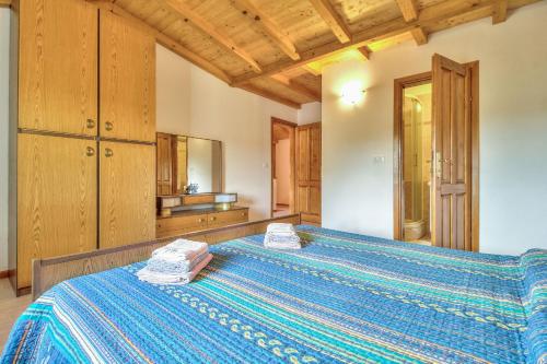 Ένα ή περισσότερα κρεβάτια σε δωμάτιο στο Villa Alba
