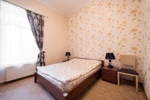 Кровать или кровати в номере Apart-Hotel next to Deribasivska