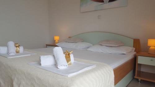 Postel nebo postele na pokoji v ubytování Rooms Florida