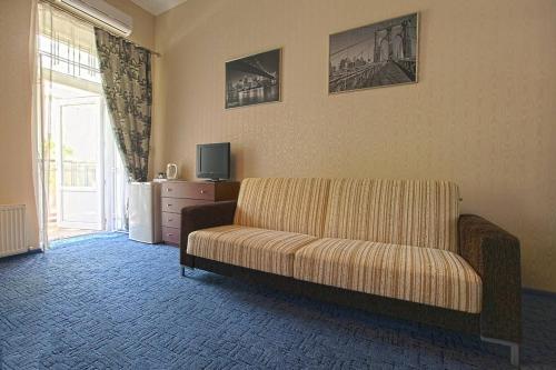 Гостиная зона в Apart-Hotel next to Deribasivska