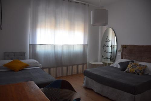 A bed or beds in a room at Levante