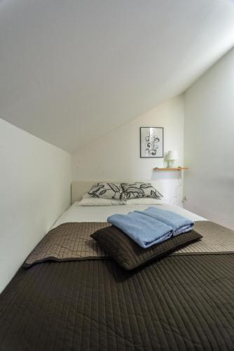 เตียงในห้องที่ Villa Rubčić