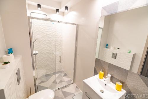 Koupelna v ubytování Cozy Apartment - Bunscha Krakow - Ruczaj