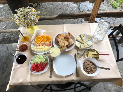 a table with a bunch of food on it at Pirikiti in Akhmety