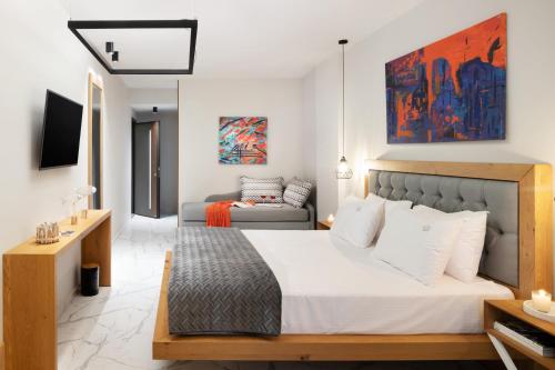 Ένα ή περισσότερα κρεβάτια σε δωμάτιο στο Sea Level Hotel - Adults Only 16 plus