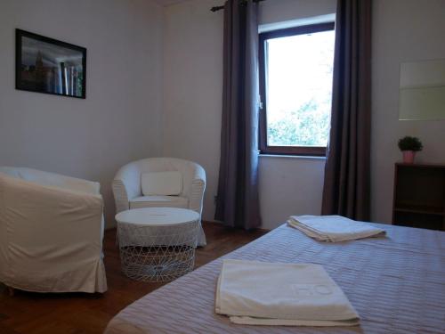 Katil atau katil-katil dalam bilik di Apartments Lada