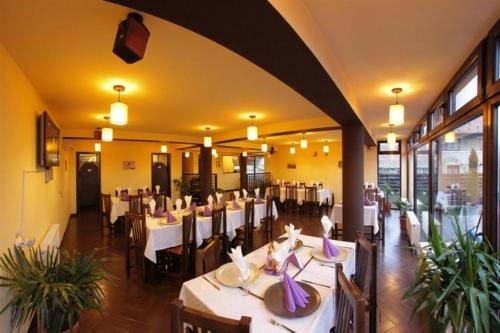 Restoran atau tempat makan lain di Pensiunea Oficial