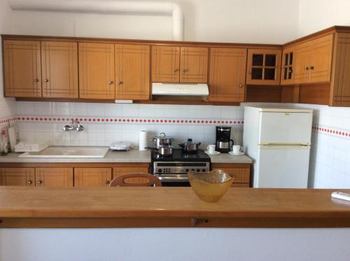 Kuchyň nebo kuchyňský kout v ubytování Comfort Apartment in Preveza