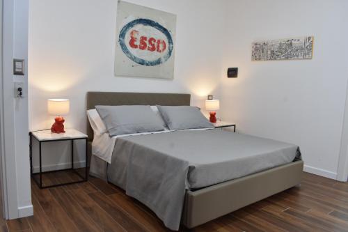 Postel nebo postele na pokoji v ubytování b&b Donna Raffaela