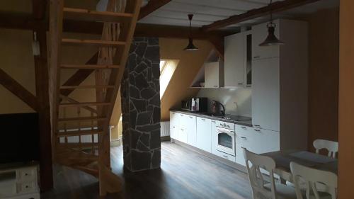 A kitchen or kitchenette at Vana Kasiino Apartement