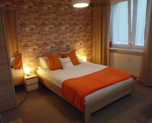Postel nebo postele na pokoji v ubytování Ares Apartments