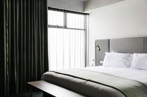 Letto o letti in una camera di United Places Hotel Botanic Gardens