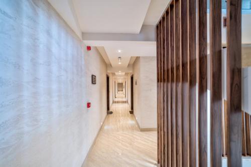 a hallway of a building with a long corridor at LUX apartman u vili Pekovic in Zlatibor