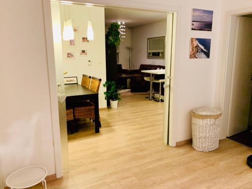 a living room with a table and a dining room at Cozy, beautiful view - 1 stop by train to old town in Bratislava