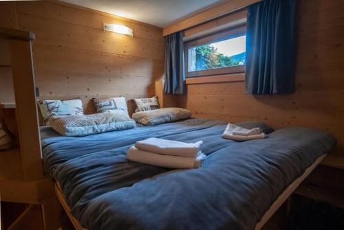Llit o llits en una habitació de Mountain Loft