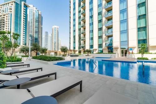 an image of a swimming pool in a building at Vida Downtown Residences in Dubai
