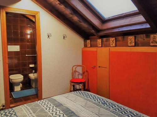 Säng eller sängar i ett rum på Relax sull'Altopiano di Asiago