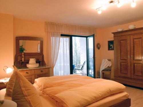 Ferienwohnung Sonja tesisinde bir odada yatak veya yataklar